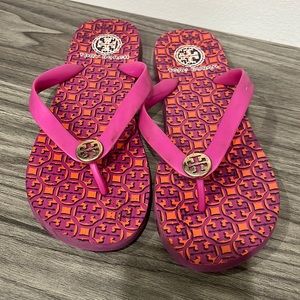 Tory Burch dark pink flip flops